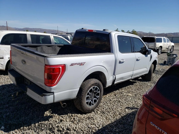 2022 Ford F-150 XL with VIN 1FTFW1E83NKE70208, listed as a Copart auction lot 49920985 with 20,745 mi miles and Salvage Title. Bid and sale history available at carsss.com. Image 3.