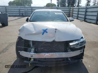2018 BMW 3 Series 320i xDrive with VIN WBA8A3C55JA357532, listed as a Copart auction lot 57561015 with 46,876 mi miles and Salvage title. Bid and sale history available at DreamBid. Image 5.