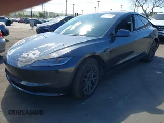 2024 Tesla Model 3 with VIN 5YJ3E1EA9RF849936, listed as a IAAI auction lot 41707656 with 18,749 mi miles and . Bid and sale history available at DreamBid. Image 20.