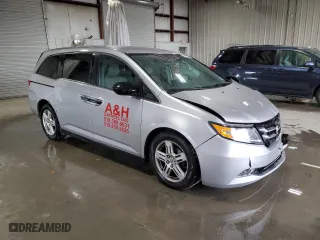 2015 Honda Odyssey LX with VIN 5FNRL5H27FB106960, listed as a Copart auction lot 51207935 with 144,668 mi miles and Salvage Title. Bid and sale history available at carsss.com. Image 4.
