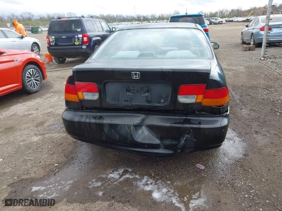 1997 Honda Civic EX with VIN 1HGEJ8242VL044722, listed as a IAAI auction lot 42045941 with 266,481 mi miles. Bid and sale history available at carsss.com. Image 16.
