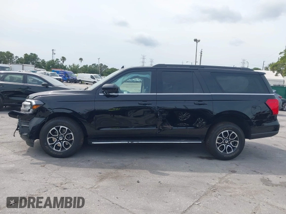 2023 Ford Expedition Max XLT with VIN 1FMJK1J81PEA03636, listed as a IAAI auction lot 42214363 with 77,017 mi miles and . Bid and sale history available at DreamBid. Image 14.