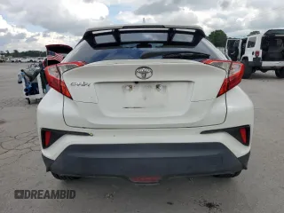 2018 Toyota C-HR XLE с VIN NMTKHMBX6JR016848, выставлен на аукционе Copart как лот 56939615 с пробегом 65 510 миль миль и Списание • Salvage title. История ставок и продаж доступна на DreamBid. Изображение 6.