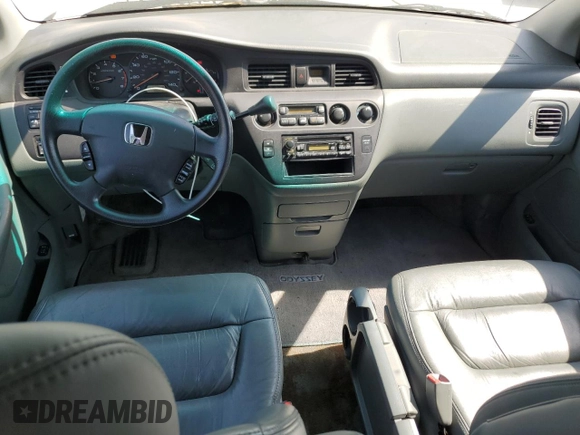 2004 Honda Odyssey EX-L with VIN 5FNRL18974B092979, listed as a Copart auction lot 52429055 with 106,515 mi miles and Clean Title. Bid and sale history available at DreamBid. Image 8.