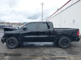 2019 Ram 1500 Big Horn/Lone Star with VIN 1C6SRFFT9KN625013, listed as a IAAI auction lot 41611276 with 100,463 mi miles. Bid and sale history available at carsss.com. Image 15.