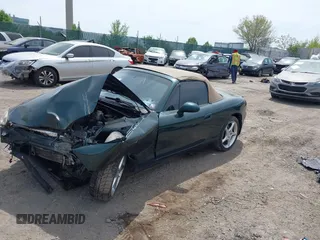 2001 Mazda MX-5 Miata with VIN JM1NB353810212361, listed as a IAAI auction lot 42128732 with 115,860 mi miles and . Bid and sale history available at DreamBid. Image 2.