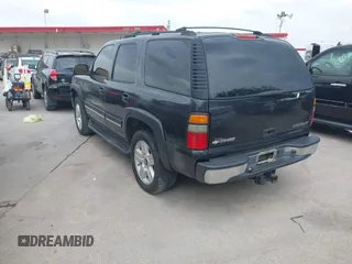 2005 Chevrolet Tahoe LT z VIN 1GNEC13T15J138079, wystawiony jako IAAI lot #42656164 z przebiegiem 331 287 mil mil oraz . Historia ofert i sprzedaży dostępna na DreamBid. Obrazek 3.