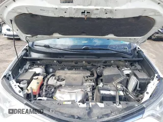 2018 Toyota RAV4 LE with VIN JTMBFREV5JJ738405, listed as a IAAI auction lot 41956145 with 100,593 mi miles and . Bid and sale history available at DreamBid. Image 10.