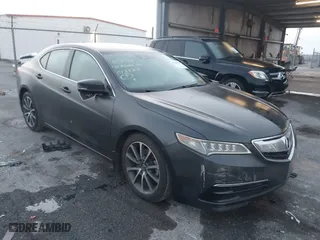 2015 Acura TLX V6 Tech with VIN 19UUB2F50FA025527, listed as a IAAI auction lot 40706351 with 121,378 mi miles. Bid and sale history available at carsss.com. Image 1.