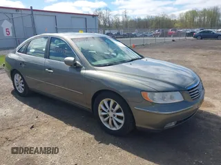 2006 Hyundai Azera SE with VIN KMHFC46F26A132762, listed as a IAAI auction lot 42142152 with 165,673 mi miles and . Bid and sale history available at DreamBid. Image 1.