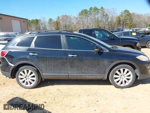 2010 Mazda CX-9 Grand Touring z VIN JM3TB3MV1A0208623, wystawiony jako IAAI lot #41668500 z przebiegiem 226 233 mil mil oraz . Historia ofert i sprzedaży dostępna na DreamBid. Obrazek 13.
