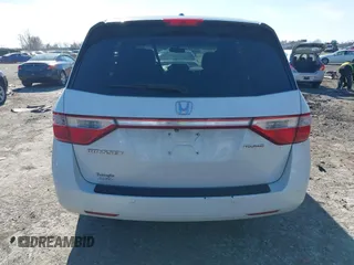 2012 Honda Odyssey Touring with VIN 5FNRL5H96CB010696, listed as a IAAI auction lot 41605868 with 109,411 mi miles and . Bid and sale history available at carsss.com. Image 16.
