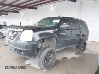 2007 GMC Yukon SLE w/3SA with VIN 1GKFC13C27R307371, listed as a IAAI auction lot 41569424 with 355,074 mi miles. Bid and sale history available at carsss.com. Image 2.