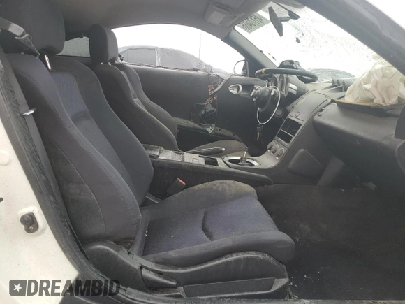 2004 Nissan 350Z Enthusiast with VIN JN1AZ34D94M102763, listed as a Copart auction lot 45170465 with 132,133 mi miles and Salvage Title. Bid and sale history available at DreamBid. Image 7.