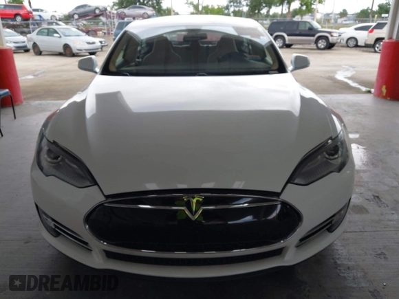 2014 Tesla Model S 60 with VIN 5YJSA1S16EFP53350, listed as a IAAI auction lot 42239753 with 104,985 mi miles and . Bid and sale history available at DreamBid. Image 12.