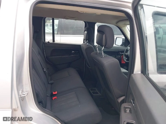 2011 Jeep Liberty Sport with VIN 1J4PN2GK6BW579234, listed as a IAAI auction lot 41118419 with 161,640 mi miles. Bid and sale history available at carsss.com. Image 8.