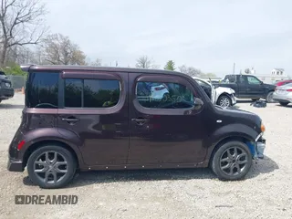 2009 Nissan Cube SL z VIN JN8AZ28R39T111263, wystawiony jako IAAI lot #42050350 z przebiegiem 253 666 mil mil oraz . Historia ofert i sprzedaży dostępna na DreamBid. Obrazek 14.