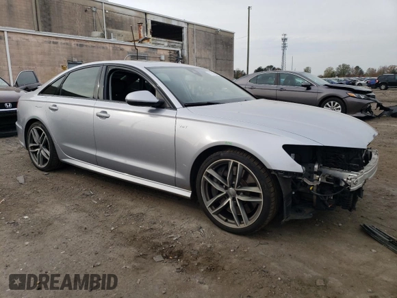 2016 Audi S6 Prestige z VIN WAUH2AFC0GN071830, wystawiony jako Copart lot #81327524 z przebiegiem 108 386 mil mil oraz Szkody całkowita. Historia ofert i sprzedaży dostępna na DreamBid. Obrazek 4.