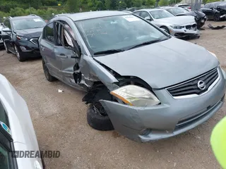 2012 Nissan Sentra SR z VIN 3N1AB6AP7CL617385, wystawiony jako IAAI lot #40008604 z przebiegiem 109 454 mil mil oraz . Historia ofert i sprzedaży dostępna na DreamBid. Obrazek 1.
