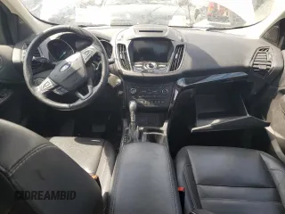 2018 Ford Escape Titanium z VIN 1FMCU9J94JUD09141, wystawiony jako Copart lot #56625805 z przebiegiem Nie podano mil oraz Szkoda całkowita • Salvage title. Historia ofert i sprzedaży dostępna na DreamBid. Obrazek 8.