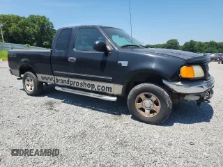 2004 Ford F-150 XL with VIN 2FTRX18W04CA13170, listed as a Copart auction lot 60932775 with 233,249 mi miles and Salvage title. Bid and sale history available at DreamBid. Image 4.