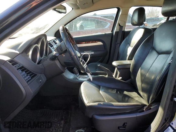 2010 Chrysler Sebring Limited with VIN 1C3CC5FB4AN111539, listed as a Copart auction lot 87454994 with 53,979 mi miles and Salvage Title. Bid and sale history available at DreamBid. Image 7.
