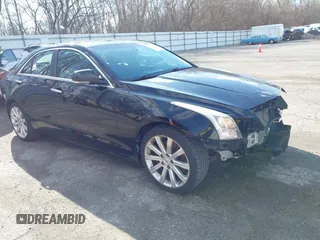 2014 Cadillac ATS Luxury AWD z VIN 1G6AH5RX7E0187421, wystawiony jako IAAI lot #41864984 z przebiegiem 102 927 mil mil oraz . Historia ofert i sprzedaży dostępna na DreamBid. Obrazek 1.