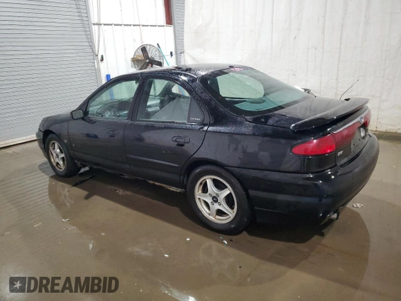 1998 Ford Contour z VIN 1FAFP68GXWK272570, wystawiony jako Copart lot #73166024 z przebiegiem 315 249 mil mil oraz Szkoda całkowita • Salvage title. Historia ofert i sprzedaży dostępna na DreamBid. Obrazek 2.