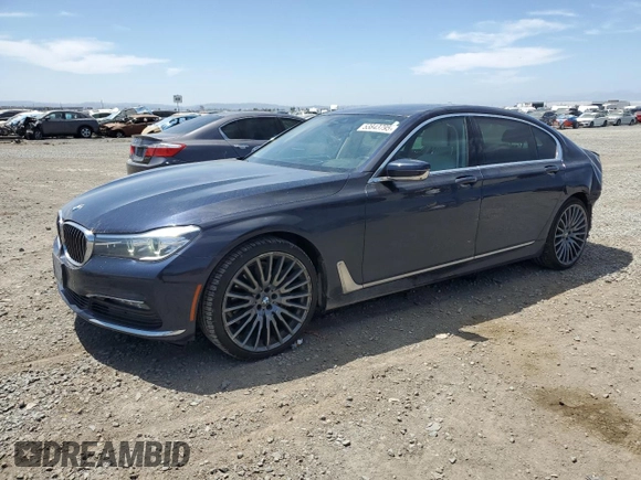 2018 BMW 7 Series 740i with VIN WBA7E2C58JG743126, listed as a Copart auction lot 53843795 with 90,614 mi miles and Salvage title. Bid and sale history available at DreamBid. Image 1.