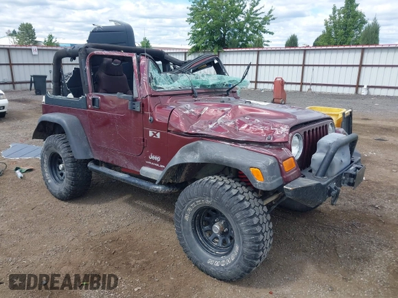 2003 Jeep Wrangler X z VIN 1J4FA39S73P349014, wystawiony jako IAAI lot #42582747 z przebiegiem 50 525 mil mil oraz . Historia ofert i sprzedaży dostępna na DreamBid. Obrazek 1.
