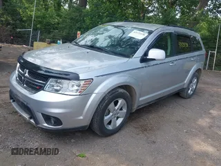 2012 Dodge Journey SXT with VIN 3C4PDDBG1CT323727, listed as a IAAI auction lot 42473238 with 77,035 mi miles and . Bid and sale history available at DreamBid. Image 17.