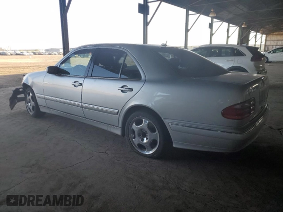 2001 Mercedes-Benz E-Class with VIN WDBJF70J51B167821, listed as a Copart auction lot 81113074 with 203,608 mi miles and Salvage Title. Bid and sale history available at carsss.com. Image 2.