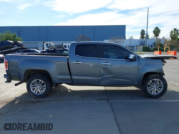 2018 GMC Canyon 4WD SLT with VIN 1GTP6DE11J1302382, listed as a IAAI auction lot 41318784 with 114,981 mi miles. Bid and sale history available at carsss.com. Image 13.