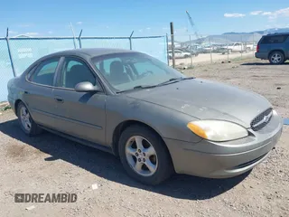 2001 Ford Taurus SES z VIN 1FAFP55U91G151125, wystawiony jako IAAI lot #42156725 z przebiegiem 146 006 mil mil oraz . Historia ofert i sprzedaży dostępna na DreamBid. Obrazek 1.