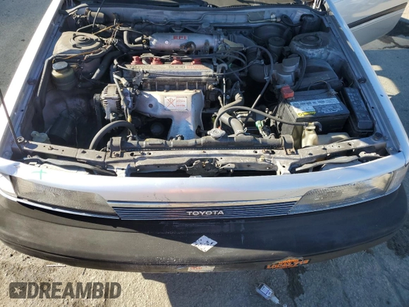 1988 Toyota Camry z VIN JT2SV24E5J3276324, wystawiony jako Copart lot #88117355 z przebiegiem 89 928 mil mil oraz Szkoda całkowita • Salvage title. Historia ofert i sprzedaży dostępna na DreamBid. Obrazek 11.