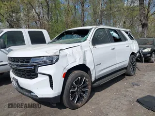 2023 Chevrolet Tahoe LS with VIN 1GNSCMKD5PR240763, listed as a IAAI auction lot 41931972 with 17,939 mi miles and . Bid and sale history available at DreamBid. Image 2.