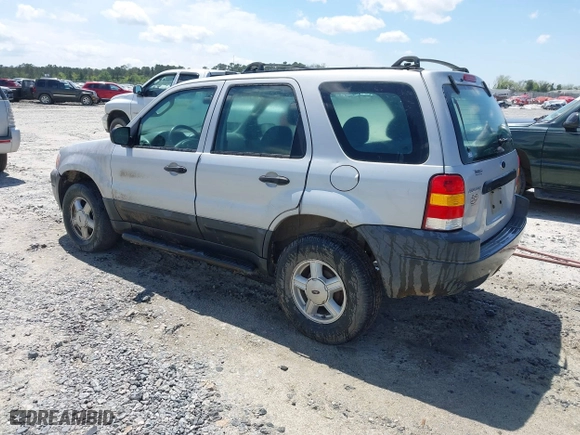 2003 Ford Escape XLS Popular with VIN 1FMYU02183KC05213, listed as a IAAI auction lot 41955134 with 305,524 mi miles. Bid and sale history available at carsss.com. Image 3.