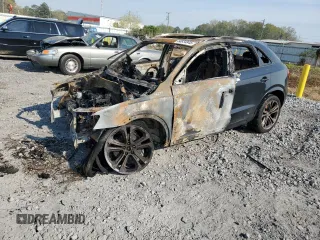 2018 Audi Q3 Premium z VIN WA1BCCFS0JR020265, wystawiony jako Copart lot #50834845 z przebiegiem Nie podano mil oraz Nie do naprawy • Non repairable. Historia ofert i sprzedaży dostępna na DreamBid. Obrazek 1.