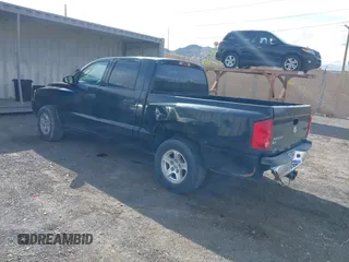 2006 Dodge Dakota SLT with VIN 1D7HE48NX6S596684, listed as a IAAI auction lot 41992956 with 255,526 mi miles and . Bid and sale history available at carsss.com. Image 3.