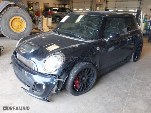 2008 MINI Cooper Hardtop S with VIN WMWMF73568TT87273, listed as a IAAI auction lot 41996859 with 107,671 mi miles. Bid and sale history available at carsss.com. Image 2.