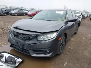 2017 Honda Civic EX-T with VIN 19XFC1F34HE014334, listed as a IAAI auction lot 42009311 with 124,717 mi miles. Bid and sale history available at carsss.com. Image 17.