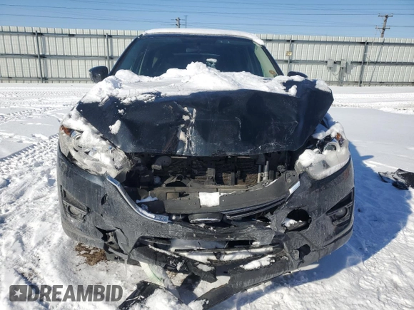 2016 Mazda CX-5 Touring with VIN JM3KE4CY7G0797190, listed as a Copart auction lot 45116385 with 0 mi miles and Salvage Title. Bid and sale history available at carsss.com. Image 5.