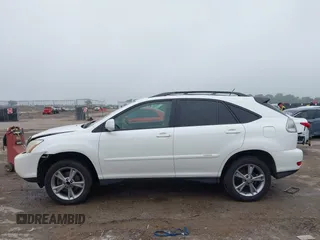 2007 Lexus RX 400h z VIN JTJGW31U572003651, wystawiony jako IAAI lot #42163515 z przebiegiem 358 648 mil mil oraz . Historia ofert i sprzedaży dostępna na DreamBid. Obrazek 14.