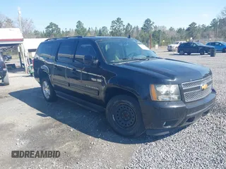 2011 Chevrolet Suburban LT with VIN 1GNSCJE06BR402433, listed as a IAAI auction lot 41819335 with 203,335 mi miles. Bid and sale history available at carsss.com. Image 1.