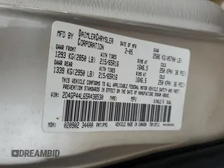 2005 Dodge Caravan SXT with VIN 2D4GP44L65R438530, listed as a Copart auction lot 63415955 with 220,852 mi miles and Salvage title. Bid and sale history available at DreamBid. Image 13.