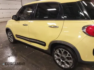 2015 FIAT 500L Urbana Trekking with VIN ZFBCFADH5FZ033844, listed as a IAAI auction lot 41186739 with 86,587 mi miles and . Bid and sale history available at DreamBid. Image 6.