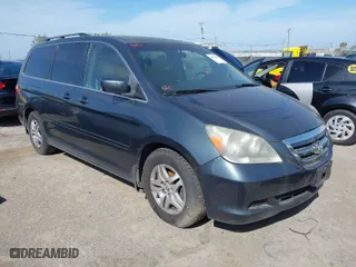 2006 Honda Odyssey EX-L with VIN 5FNRL38706B081643, listed as a IAAI auction lot 42064699 with 204,918 mi miles. Bid and sale history available at carsss.com. Image 1.