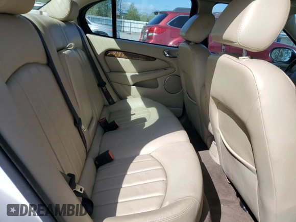 2006 Jaguar X-Type with VIN SAJWA51A06WE68591, listed as a Copart auction lot 53020355 with 179,379 mi miles and Salvage Title. Bid and sale history available at DreamBid. Image 10.
