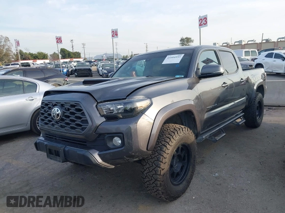 2021 Toyota Tacoma 4WD SR5 with VIN 3TMDZ5BN2MM108586, listed as a IAAI auction lot 41604953 with 65,422 mi miles. Bid and sale history available at carsss.com. Image 17.