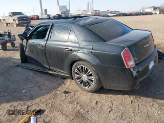2014 Chrysler 300 with VIN 2C3CCAGT6EH209437, listed as a IAAI auction lot 41780106 with 153,414 mi miles. Bid and sale history available at carsss.com. Image 3.